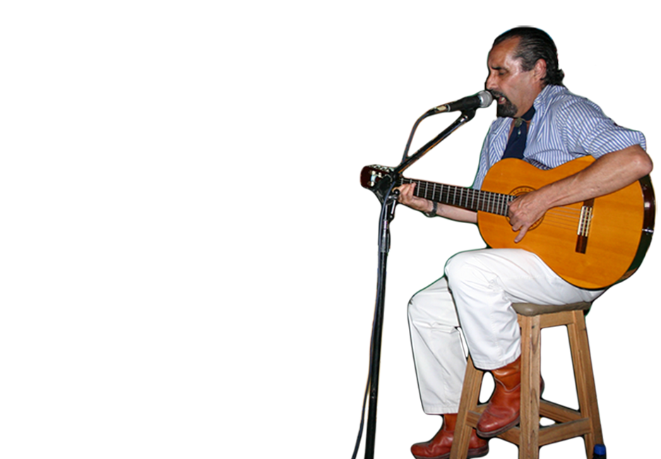 jose eduardo chango mac tocando la guitarra